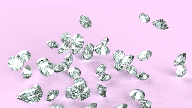 ピンクの背景に散らばるダイヤモンド